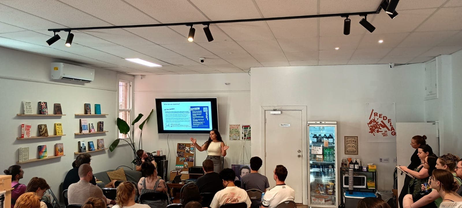People attend a volunteer briefing at the VS volunteer centre in February